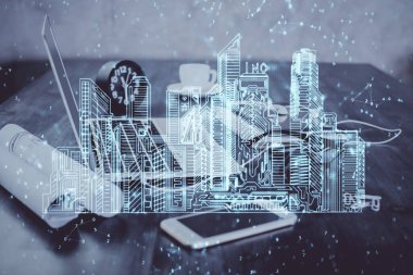 Ofisteki masaüstü bilgisayar geçmişi ve büyük kasaba binaları hologram çizimi. Çifte maruziyet. Akıllı şehir konsepti.