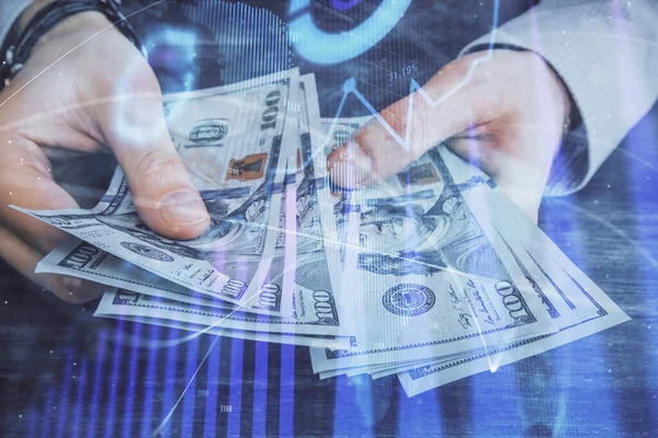 Multi blootstelling van de financiële grafiek tekenen hologram en Amerikaanse dollars rekeningen en man handen. Analyse concept. — Stockfoto