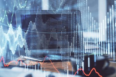 Kişisel bilgisayar arkaplanına çizilmiş borsa hologramı. Çifte maruziyet. Yatırım kavramı.