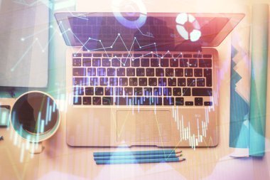 Bilgisayarla masaüstü arkaplanı üzerinde ön x grafik çizimi çift pozlama. Finansal analiz kavramı. Üst görünüm.