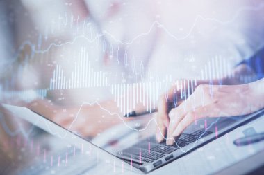 Bilgisayarda ve ön x grafik hologram çiziminde kadın eli yazarken çift pozlama. Borsa yatırım kavramı.