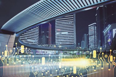 Veri temalı hologram gökdelenler arka planda çoklu pozlama ile şehir görünümüne çizim yapıyor. Büyük veri kavramı.