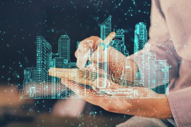 Erkeklerin el yazısı üzerine soyut holografik şehir. Çoklu pozlama.