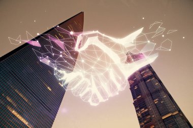 Şehir manzarası arka planında el sıkışma hologramına çifte maruz kalma. Ortaklık kavramı.