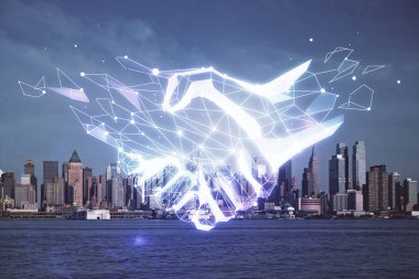 Şehir manzarası arka planında el sıkışma hologramına çifte maruz kalma. Ortaklık kavramı.