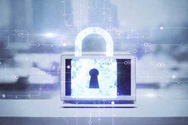 Bilgisayar ve ikon hologramı ile masaüstüne çift pozlama. Veri güvenliği kavramı.