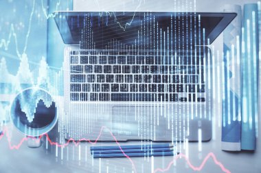 Bilgisayarla masaüstü arkaplanı üzerinde ön x grafik çizimi çift pozlama. Finansal analiz kavramı. Üst görünüm.