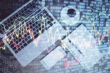 Finans piyasası grafiği ve masaüstü bilgisayarının üst görüntüsü. Çifte maruziyet. Yatırım kavramı.