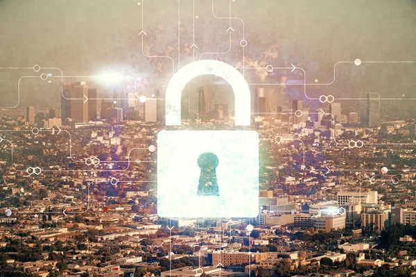 Lock icon hologram on city view with skyscrapers background multi exposure. Data security concept.