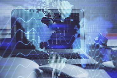 Kişisel bilgisayar arkaplanına çizilmiş borsa hologramı. Çoklu maruz kalma. Yatırım kavramı.