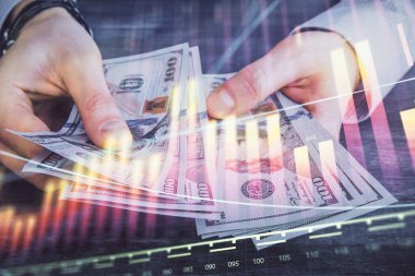 Finansal grafiğe çoklu pozlama hologram, Amerikan dolarları ve insan eli. Analiz kavramı.