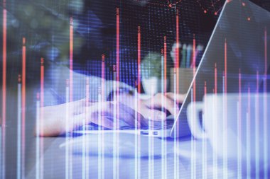 Bilgisayarda ve ön x grafik hologram çiziminde kadın eli yazarken çift pozlama. Borsa yatırım kavramı.