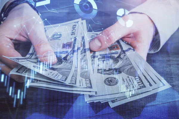 Multi exponering av finansiella diagram rita hologram och USA dollar räkningar och manshänder. Analyskoncept. — Stockfoto