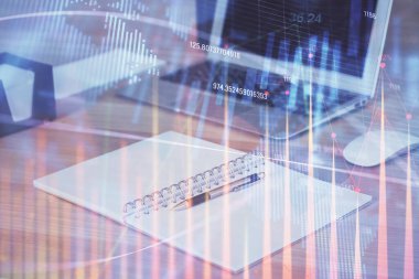 Finansal grafik renkli çizimler ve arka planda bilgisayar olan tablolar. Çoklu maruz kalma. Uluslararası pazarlar kavramı.