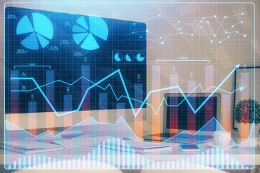 Finansal tablo çizimi ve arka planda bilgisayar olan bir tablo. Çoklu maruz kalma. Uluslararası pazarlar kavramı.