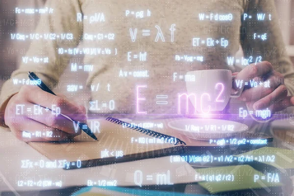 Science formula hologram over womans hands taking notes background. Concept of study. Double exposure — Stock Photo, Image