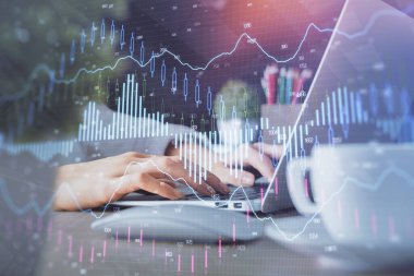 Bilgisayarda ve ön x grafik hologram çiziminde kadın eli yazarken çift pozlama. Borsa yatırım kavramı.