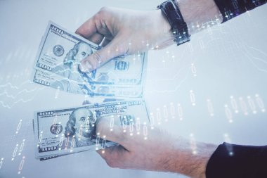 Finansal grafiğe çoklu pozlama hologram, Amerikan dolarları ve insan eli. Analiz kavramı.