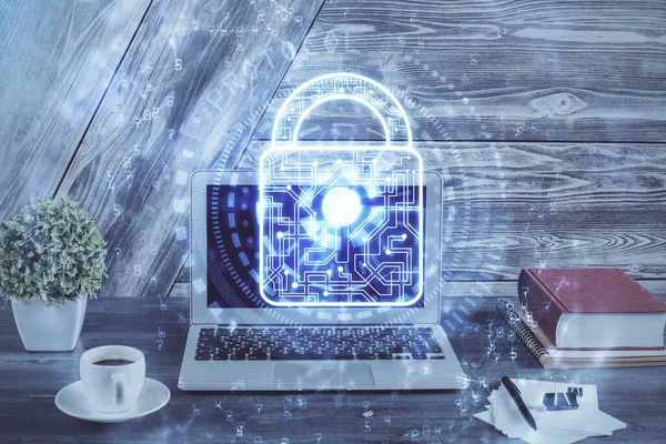 Doppelbelichtung des Desktops mit Computer- und Lock-Symbol-Hologramm. Konzept der Datensicherheit. — Stockfoto