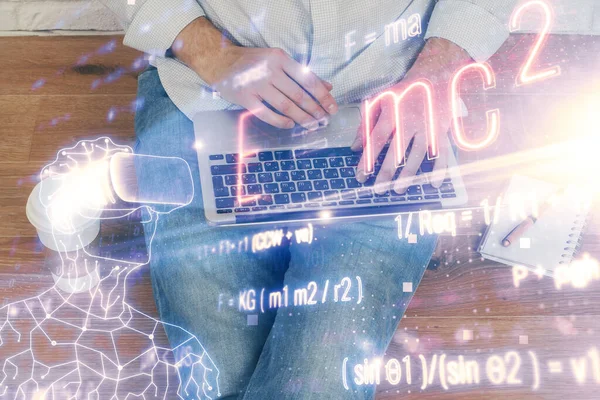 Science formula hologram with man working on computer on background. Education concept. Double exposure.