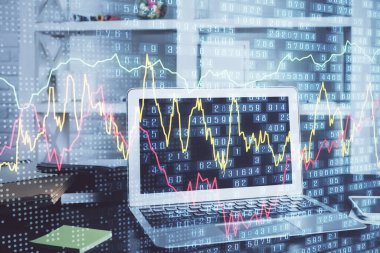 Finansal pazar grafiği hologramı ve kişisel bilgisayar arka planda. Çoklu maruz kalma. Önx kavramı.