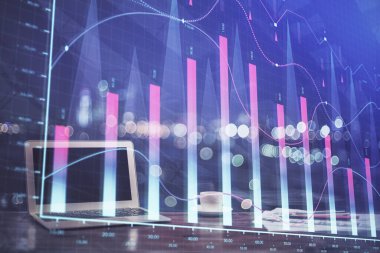 Masası ve kişisel bilgisayarı olan borsa grafiği. Çifte maruziyet. Mali analiz kavramı.