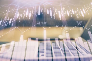 Finansal grafik renkli çizimler ve arka planda bilgisayar olan tablolar. Çoklu maruz kalma. Uluslararası pazarlar kavramı.