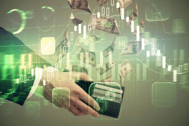 Finansal grafiğe çoklu pozlama hologram, Amerikan dolarları ve insan eli. Analiz kavramı.