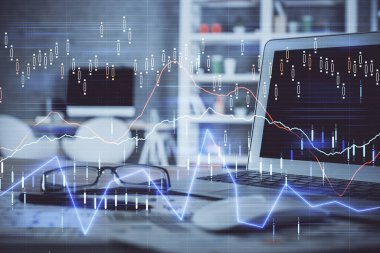 Finansal grafik renkli çizimler ve arka planda bilgisayar olan tablolar. Çifte maruziyet. Uluslararası pazarlar kavramı.