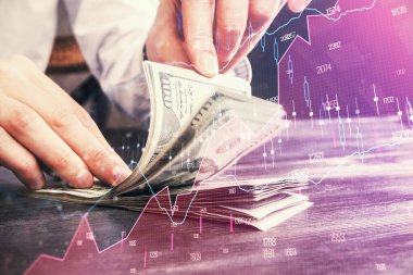 Forx grafiği, hologram, Amerikan dolarları ve insan eli çizimleri. Teknik Analiz kavramı.