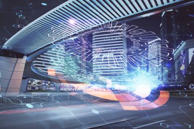 Veri temalı hologram gökdelenler arka planda çoklu pozlama ile şehir görünümüne çizim yapıyor. Büyük veri kavramı.