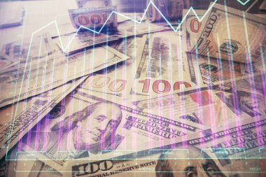 Forx grafiğinin çok sayıda görüntüsü bize dolar banknotları arka planında görünüyor. Finansal başarı piyasası kavramı.