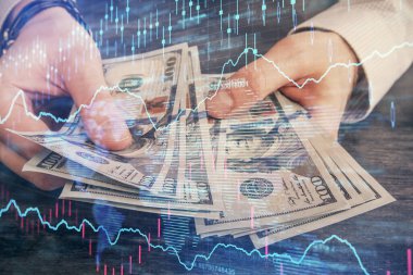 Finansal grafiğe çoklu pozlama hologram, Amerikan dolarları ve insan eli. Analiz kavramı.