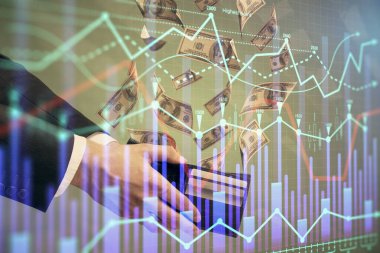 Finansal grafiğe çoklu pozlama hologram, Amerikan dolarları ve insan eli. Analiz kavramı.