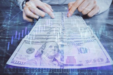 Forx grafiği, hologram, Amerikan dolarları ve insan eli çizimleri. Teknik Analiz kavramı.