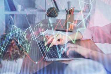 Bilgisayarda ve ön x grafik hologram çiziminde kadın eli yazarken çift pozlama. Borsa yatırım kavramı.