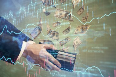 Finansal grafiğe çoklu pozlama hologram, Amerikan dolarları ve insan eli. Analiz kavramı.