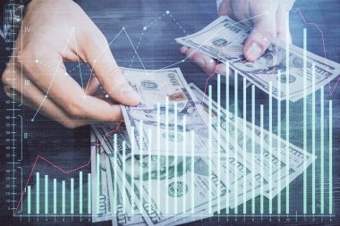 Finansal grafiğe çoklu pozlama hologram, Amerikan dolarları ve insan eli. Analiz kavramı.