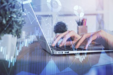 Bilgisayarda ve ön x grafik hologram çiziminde kadın eli yazarken çift pozlama. Borsa yatırım kavramı.