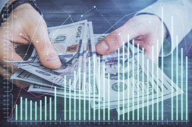 Finansal grafiğe çoklu pozlama hologram, Amerikan dolarları ve insan eli. Analiz kavramı.