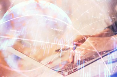 Bilgisayarda ve ön x grafik hologram çiziminde kadın eli yazarken çift pozlama. Borsa yatırım kavramı.