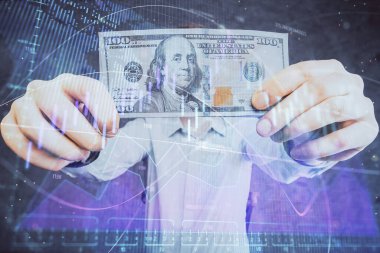 Forx grafiği, hologram, Amerikan dolarları ve insan eli çizimleri. Teknik Analiz kavramı.