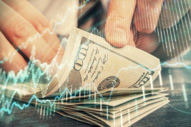 Forx grafiği, hologram, Amerikan dolarları ve insan eli çizimleri. Teknik Analiz kavramı.