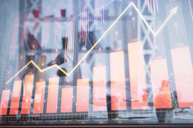 Borsa grafik çizimi ve ofis içi arka planının iki katına çıkarılması. Mali analiz kavramı.