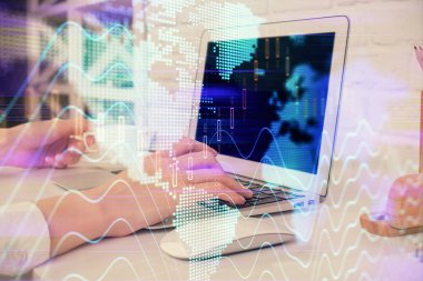 Bilgisayarda ve ön x grafik hologram çiziminde kadın eli yazarken çift pozlama. Borsa analizi kavramı.