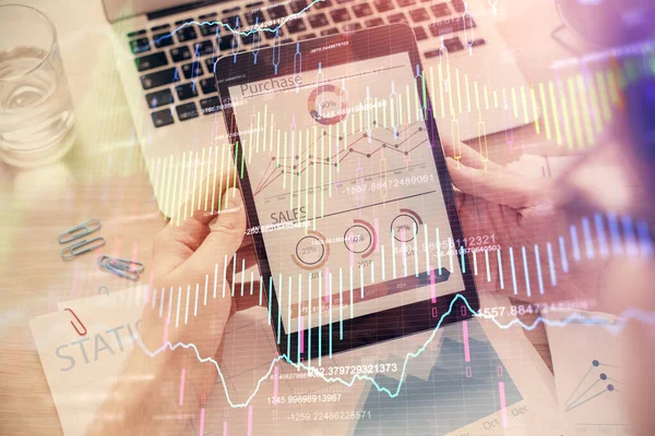 Double exposure of mans hands holding and using a digital device and forex graph drawing. Financial market concept. — Stock Photo, Image