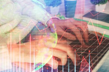 Bilgisayarda ve ön x grafik hologram çiziminde kadın eli yazarken çift pozlama. Borsa yatırım kavramı.