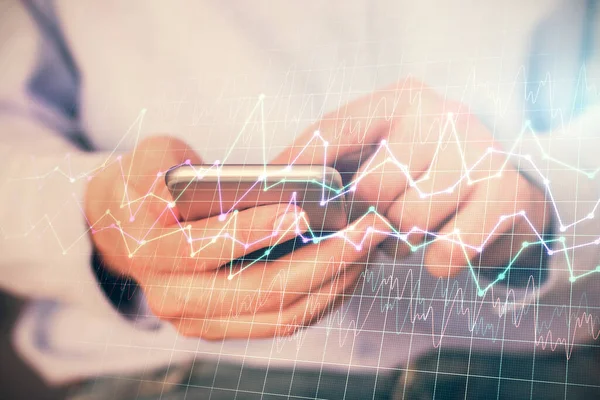 Multi expozíció man kezét tartó és egy digitális telefon és forex grafikon rajz. A pénzügyi piac fogalma. — Stock Fotó