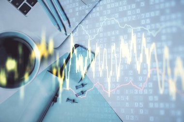 Bilgisayarla masaüstü arkaplanı üzerinde ön x grafik çizimi çift pozlama. Finansal analiz kavramı. Üst görünüm.