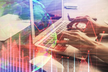 Bilgisayarda ve ön x grafik hologram çiziminde kadın eli yazarken çift pozlama. Borsa yatırım kavramı.